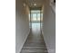 Hallway featuring luxury vinyl plank flooring with an entrance to the living room at 586 N Sparkleberry St, Chester, SC 29706