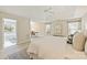 Open-concept main bedroom featuring a desk area, ensuite bathroom, and neutral color palette at 6008 Nuthatch Ct, Charlotte, NC 28277