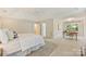 Spacious main bedroom with a desk area, ensuite bathroom, and a calm, comfortable atmosphere at 6008 Nuthatch Ct, Charlotte, NC 28277