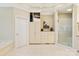 The main bathroom features built-in cabinetry, and a glass shower at 6510 Seton House Ln, Charlotte, NC 28277