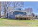 House exterior featuring a large deck and backyard at 704 N Main Ave, Newton, NC 28658