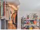 Walk-in closet with organization and space for a variety of clothing and storage at 704 N Main Ave, Newton, NC 28658