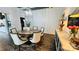 Dining room features a round wood table with 6 chairs and a vintage cabinet at 704 N Main Ave, Newton, NC 28658
