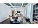 Bright dining room with coffered ceilings, hardwood floors, lots of natural light and dining furniture at 704 N Main Ave, Newton, NC 28658