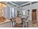Elegant dining room with a coffered ceiling, chandelier and hardwood flooring at 704 N Main Ave, Newton, NC 28658