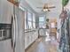 Bright kitchen with stainless steel appliances, granite counters, and ample windows at 704 N Main Ave, Newton, NC 28658