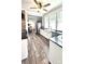 Bright kitchen boasts granite countertops, stainless steel appliances, and hardwood flooring at 704 N Main Ave, Newton, NC 28658