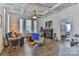 Charming living room with hardwood floors, coffered ceiling, fireplace, and view to dining room at 704 N Main Ave, Newton, NC 28658