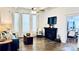 Bright living room features hardwood floors, a fireplace, and an adjacent dining room at 704 N Main Ave, Newton, NC 28658