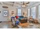 Bright living room features hardwood floors, coffered ceiling, and plenty of natural light at 704 N Main Ave, Newton, NC 28658