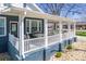 Lovely porch with ample seating, providing an ideal space for relaxation at 704 N Main Ave, Newton, NC 28658