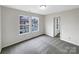 This cozy bedroom offers natural light and neutral paint, great for personalization at 722 Ladino Ln, Clover, SC 29710