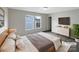 Comfortable, virtually staged bedroom with a large window, soft carpet, and modern decor at 722 Ladino Ln, Clover, SC 29710