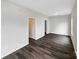 Bright bedroom with neutral walls, wood-look flooring, and multiple entryways at 722 Ladino Ln, Clover, SC 29710