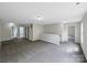 Large bonus room with neutral walls, carpeted floors, and ample natural light at 722 Ladino Ln, Clover, SC 29710