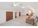 Bright bonus room features neutral carpet and white paint, suitable for multiple furniture configurations at 727 Mayfield Ct, Fort Mill, SC 29715