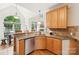 Modern kitchen featuring granite countertops, stainless steel appliances and a breakfast bar overlooking an eating area at 727 Mayfield Ct, Fort Mill, SC 29715