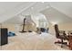 Spacious bonus room featuring exercise equipment, desk and chair with a view at 7509 Webbs Chapel Cove Ct, Denver, NC 28037