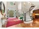 Welcoming foyer with a curved staircase, arched doorway, and views of the outdoor landscape at 7509 Webbs Chapel Cove Ct, Denver, NC 28037
