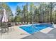 Sparkling pool and spacious deck offer the perfect spot for outdoor fun at 7509 Webbs Chapel Cove Ct, Denver, NC 28037