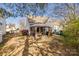 Picture of the back of the property with a patio, grill, and manicured backyard at 810 Rock Lake Gln, Fort Mill, SC 29715