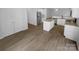 Well-lit kitchen boasting stainless steel appliances, granite countertops, and a central island at 9037 Pembroke Ct, Fort Mill, SC 29707