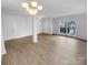 Spacious living room featuring hardwood floors, ample natural light, and a modern design at 9037 Pembroke Ct, Fort Mill, SC 29707