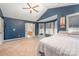 Large main bedroom featuring ample natural light, en suite bath and neutral carpet at 9238 Heritage Woods Pl, Charlotte, NC 28269