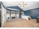 Spacious main bedroom with vaulted ceiling, ample natural light, and neutral carpet at 9238 Heritage Woods Pl, Charlotte, NC 28269