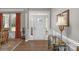 Welcoming foyer with front door, hardwood floors, decorative lighting, and elegant furnishings, creating a grand entrance at 1005 Palace Ct # 58, Indian Trail, NC 28079