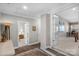 Well-lit hallway with doorways leading to bedrooms and other living spaces at 1005 Palace Ct # 58, Indian Trail, NC 28079