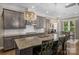 Elegant kitchen with granite counters, stainless steel appliances, and a breakfast bar at 1005 Palace Ct # 58, Indian Trail, NC 28079