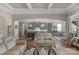 Open-concept living room with coffered ceiling and easy flow to the kitchen and dining area at 1005 Palace Ct # 58, Indian Trail, NC 28079
