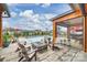 Inviting backyard featuring a fire pit, outdoor seating, a pool, and an outdoor kitchen at 101 S Shore Dr, Belmont, NC 28012
