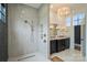 Beautiful bathroom with granite countertop, tiled shower, and chandelier at 101 S Shore Dr, Belmont, NC 28012