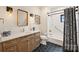 Beautiful bathroom with a dual vanity, modern fixtures, and a shower-tub combination at 101 S Shore Dr, Belmont, NC 28012