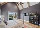 Beautiful main bedroom features vaulted ceiling, ceiling fan, and access to a private balcony at 101 S Shore Dr, Belmont, NC 28012