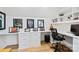 Well-organized home office with built-in desks, ample storage, and sports memorabilia displays at 101 S Shore Dr, Belmont, NC 28012