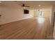 Large bonus room with wood flooring, recessed lighting, and ample space for entertaining at 108 Winners Cir # 5, Mooresville, NC 28117