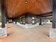 A beautifully designed porch with stone pillars and a warm wooden ceiling at 108 Winners Cir # 5, Mooresville, NC 28117