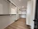 Spacious walk-in closet featuring custom shelving and drawer units with ample storage space at 108 Winners Cir # 5, Mooresville, NC 28117