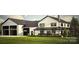 Charming two-story home with a black metal roof, covered porch, and three-bay garage at 109 Winners Cir # 1, Mooresville, NC 28117