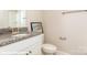 Bathroom featuring granite counters, single sink, toilet and bathtub at 116 Asmodean Ln, Troutman, NC 28166