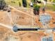 Aerial view of residential lot with the land cleared for construction featuring road access at 118 Winners Cir # 4, Mooresville, NC 28117