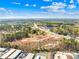 An aerial view of a new construction site featuring nearby buildings and a scenic wooded area at 118 Winners Cir # 4, Mooresville, NC 28117