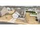 Aerial view of the home showing the manicured lawn and neighborhood at 1205 Brooksland Pl, Waxhaw, NC 28173
