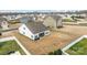 Expansive backyard with fenced-in area and screened-in porch, perfect for outdoor entertaining and enjoying the community views at 1205 Brooksland Pl, Waxhaw, NC 28173