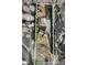 Aerial view of property showcasing layout with elongated driveway, adjacent building, and expansive outdoor recreational space at 126 Goat Trl, China Grove, NC 28023