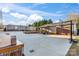 Large backyard with a pizza oven, basketball court, and outdoor seating area at 126 Goat Trl, China Grove, NC 28023