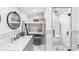 Modern bathroom with a luxurious walk-in shower, a stylish sink, and well-placed shelves for storage at 126 Goat Trl, China Grove, NC 28023